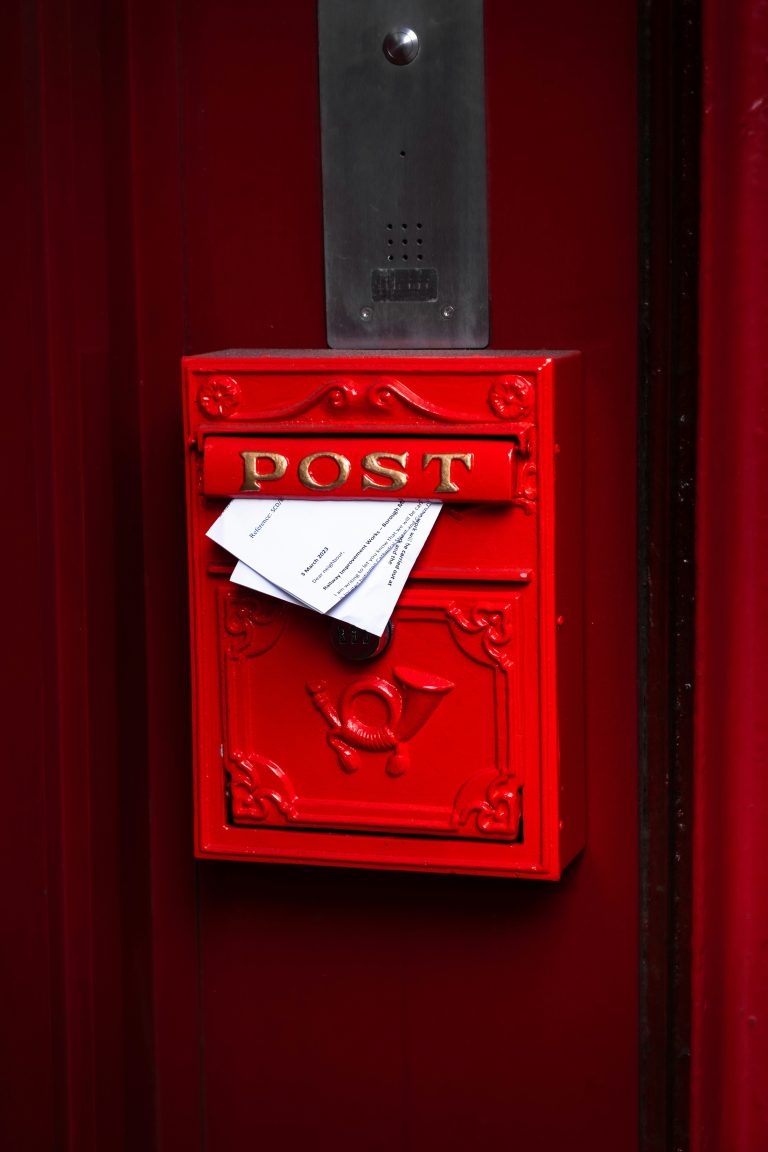 Mailbox with mail coming out.